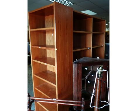 TWO SETS OF TALL LIGHT WOOD BOOKCASES