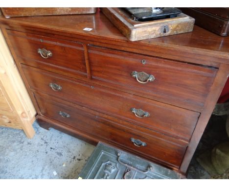 A VINTAGE MAHOGANY CHEST OF DRAWER, two short above, two long below
