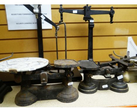 THREE VINTAGE CAST METAL WEIGHING SCALES