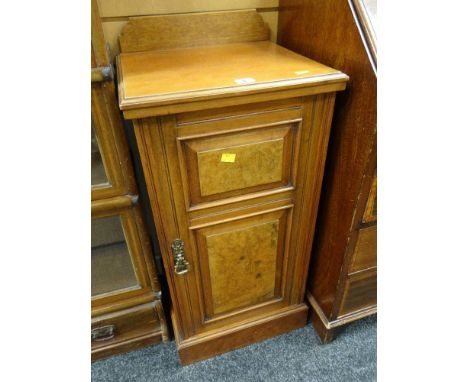 EARLY C20TH MIXED WOOD POT-BOARD CUPBOARD  with panelled door revealing fitted shelf 84 cms high