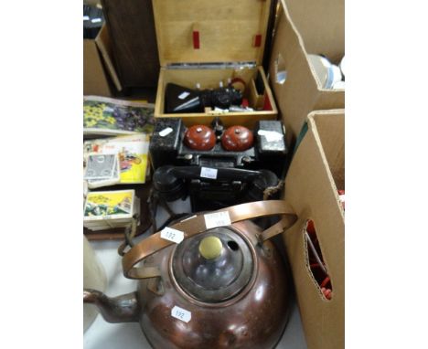 A VINTAGE MILITARY FIELD STYLE TELEPHONE AND RECEIVER, boxed, lenses, copper kettle
