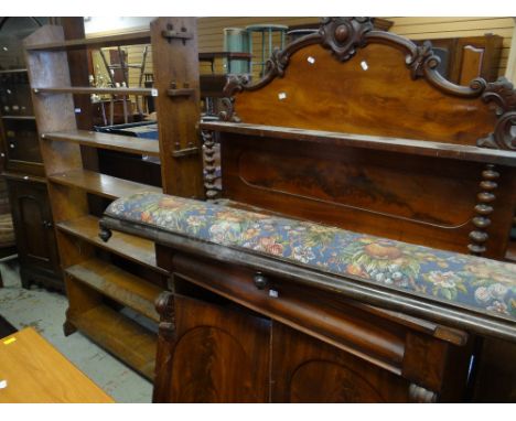 A VINTAGE OAK TALL PEG-ENDED BOOKCASE, together with a flame mahogany shelf-backed sideboard and long stool