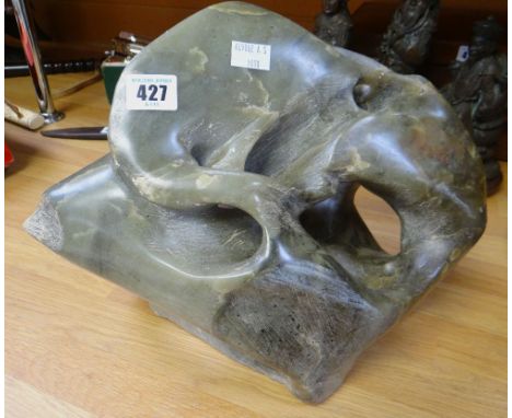 A LARGE BELIEVED JADE MINERAL ABSTRACT SCULPTURE of natural form, 37cms wide x 34cms high