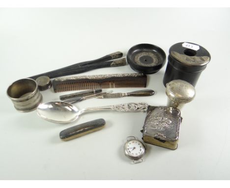 A TIN OF SILVER/PART SILVER ITEMS to include napkin ring, comb, glove stretchers, Bible, walking stick handle etc.