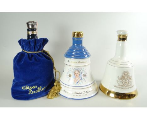 WHISKY DECANTERS being two Bells Old Scotch whisky decanters and a Chivas Regal bottle with cover