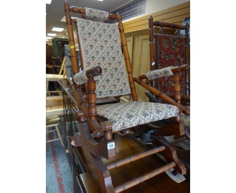 VINTAGE AMERICAN ROCKING CHAIR with bobbin turned back and arm supports
