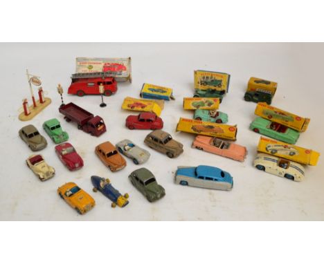 A quantity of vintage playworn diecast toy vehicles, predominantly Dinky, including various motor racing cars, some boxed, a 