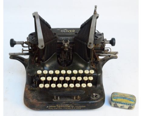 A c.1910 American "Oliver" typewriter, the first effective "visible print" typewriter with inverted u-shaped type bars arrang