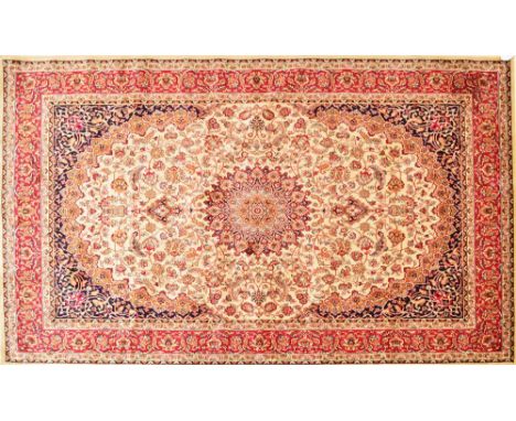 A beige ground Keshan carpet, 230 x 160cm.