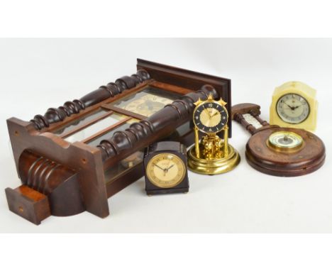 A walnut cased Vienna style rectangular eight day wall clock, height 60cm, two electric mantel clocks, an anniversary clock a