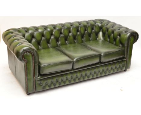 A modern green leather button upholstered Chesterfield type settee.