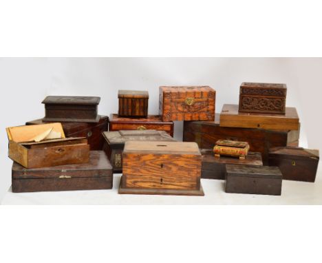 A large collection of wooden boxes including a twin handled rosewood example, a sarcophagus tea caddy, a mother of pearl inla
