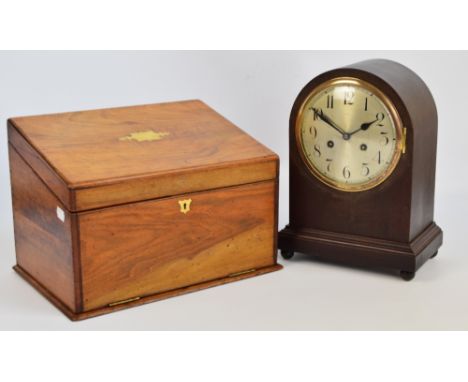 A Victorian walnut writing slope/stationery box, the hinged lid set with vacant brass cartouche enclosing a stationery rack, 