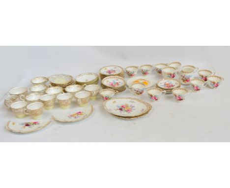 A Colclough part tea service with yellow centres and gilt floral rim comprising jug and bowl, six tea plates, six cups and sa