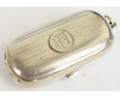 A George V hallmarked silver double sovereign case with engine turned decoration centred with oval cartouche initialled "FH" 
