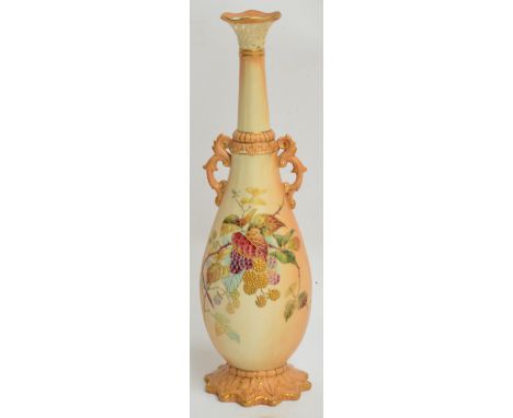 A Locke & Co. Worcester blush ivory twin handled vase of slender bottle form with reticulated rim decorated with gilt heighte