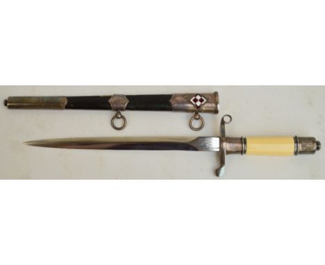 A c.1950s Polish People's Republic Air Force dagger with resin handle and leather scabbard bearing enamel air force checkerbo