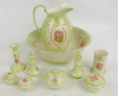 A Devon ware "Wren" toilet jug and bowl set. CONDITION REPORT: General wear throughout, crazing and rubbing. Chips to larger 