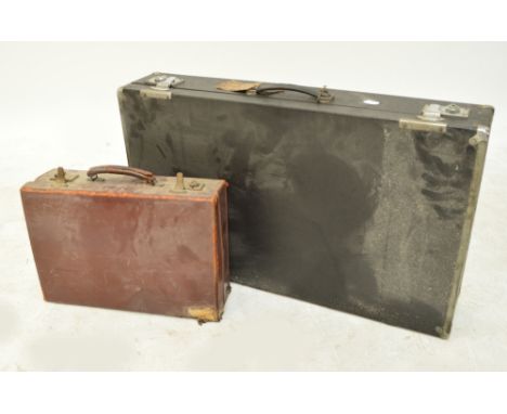Two vintage suitcases (one af).