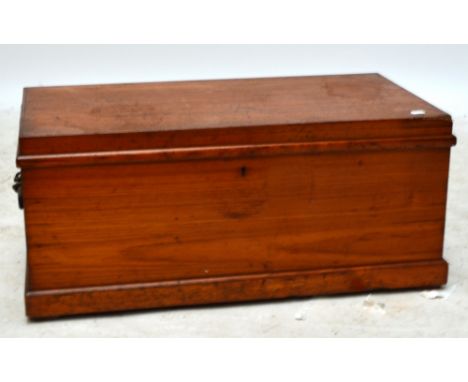 An early to mid 20th century pine rectangular trunk with hinged lid, width 79cm.