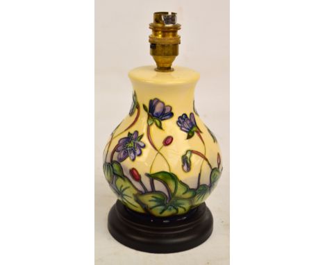 A modern Moorcroft lamp base of squat baluster form in "Ashwood Hepatica" pattern by Emma Bosson, height excluding fitting 19