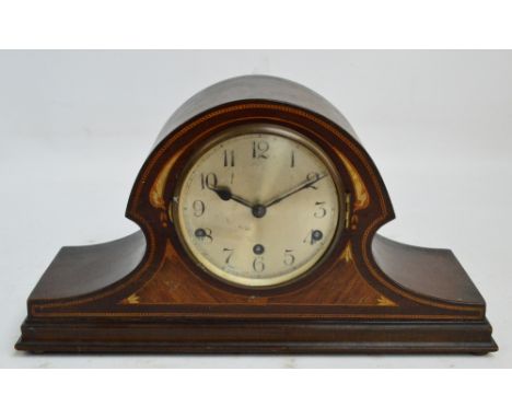 An Edwardian inlaid mahogany eight day Napoleon's hat chiming mantel clock.