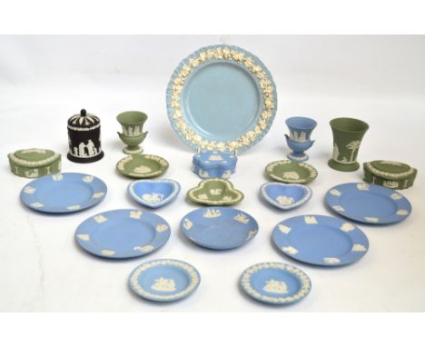 A quantity of green, powder blue and black Wedgwood jasperware with classical scenes including vases, trinket boxes, plates, 