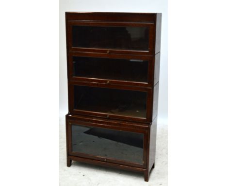 An early 20th century oak Globe Wernicke style four tier stacking bookcase, width 87cm.