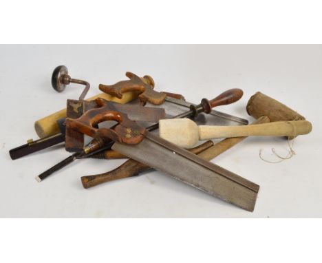 A quantity of tools and kitchenalia including saws, a chisel, mallet, rolling pin, etc.