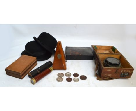 A mixed lot of collectables comprising agricultural medals, a faux book box, two bowler hats, a metronome, a boxed military c