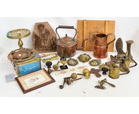 A quantity of assorted metalware to include a copper teapot, copper jug, engraving plate, various doors handles, blow lamps, 