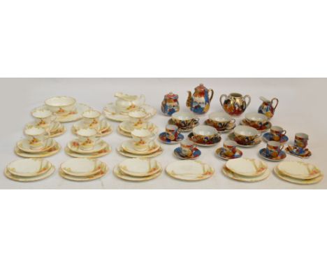 A Paragon "Lugano" part tea set comprising six trios, five spare saucers and side plates, a milk jug, a sugar bowl, two sandw