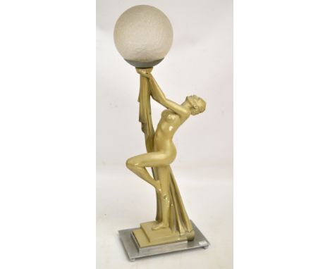 An Art Deco composite stylised nude female figure table lamp on chrome base, with crackle glass globular shade, height 71cm.