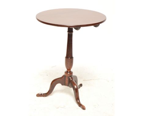 A 19th century mahogany tilt top circular tripod table, diameter 57cm, height 73cm.