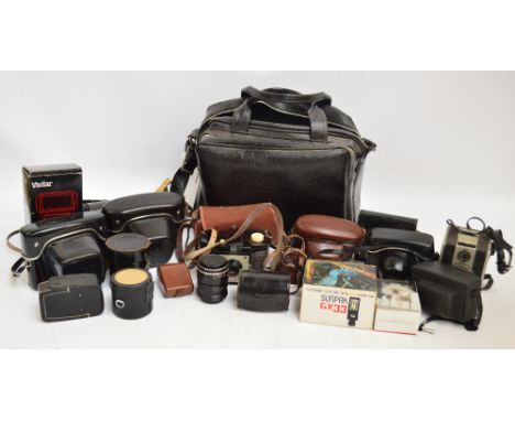 A large quantity of cameras and camera equipment including a Kodak Cresta Brownie, in canvas case, a Coronet Twelve-20, a Pra