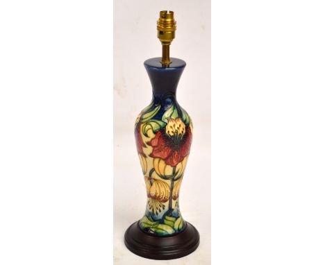 A modern Moorcroft tall baluster lamp base in "Anna Lily" pattern by Nicola Slaney, height excluding fitting 35cm. CONDITION 