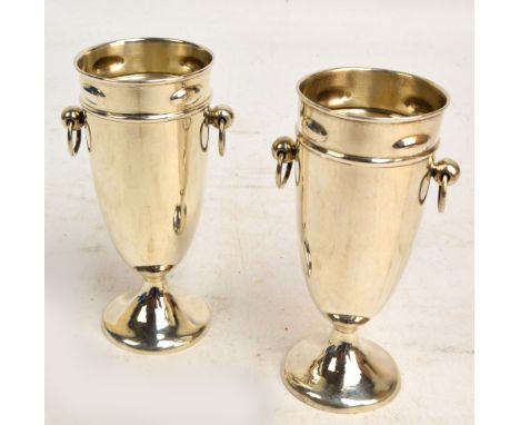 A pair of George V hallmarked silver twin handled vases of ovoid form raised on circular feet, William Hutton & Sons Ltd, Bir