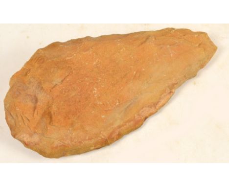 An ancient hand axe, early African type, dated 1.3BP, 23 x 11.5cm. Reputedly found in 2000, Tabak, Algeria. 