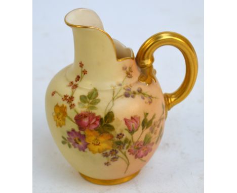 A Royal Worcester blush ivory floral decorated jug with gilt heightened handle, puce marks to base, date code for 1905, retai