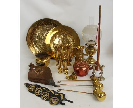 A mixed lot of metalware including oil lamp, kettle, warming pan, jugs, vases, pair of bellows, etc.