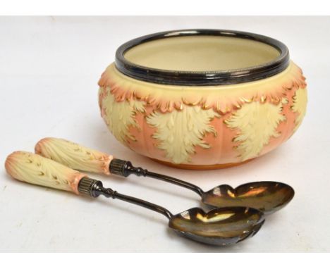 A Locke & Co Worcester blush ivory salad bowl with gilt heightened moulded foliate decoration, shape number erased from base,