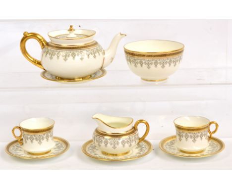 A Cauldon Ltd cabaret tea service comprising teapot, sugar bowl, cream jug and two trios. CONDITION REPORT: Appears good with