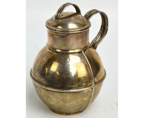 A Victorian hallmarked silver tea caddy in the form of a Guernsey jug, Walter and John Barnard, London 1895, height 15cm, app