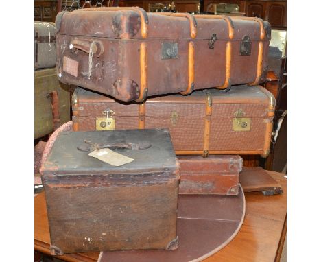 A large vintage leather wood and metal bound suitcase, 52 x 30 x 90cm, a similar canvas bound example, a smaller leatherbound