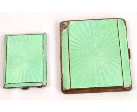A George V Silver Jubilee hallmarked silver and pale green guilloche enamel decorated and engine turned decorated matchbook c