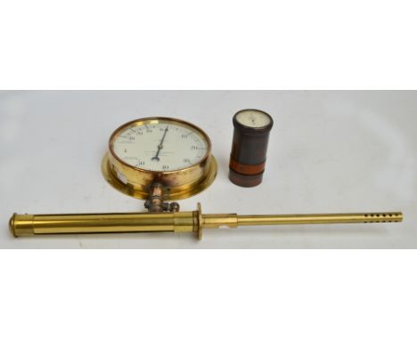 A large brass circular pressure gauge, the dial stamped "G.N. Haden & Sons Ltd. Engineers Manchester", diameter 20cm, with va