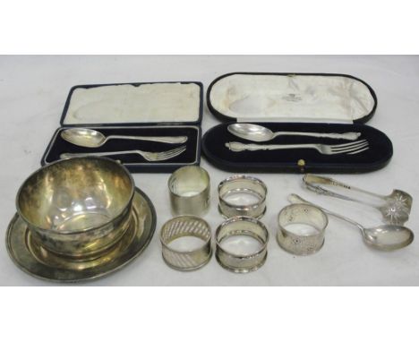 Silver cased spoon and fork sets; together with napkin rings, bowl, tray and flatware