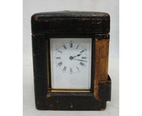A cased 19th century brass quarter repeater carriage clock, with key and three settings to the base for silent etc
