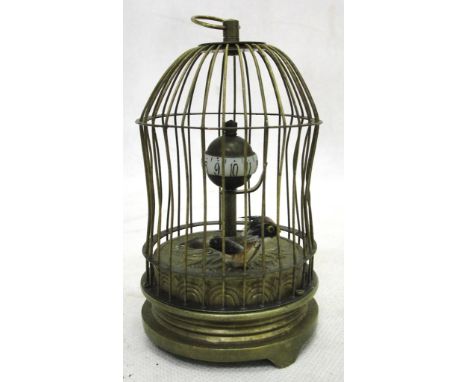 A bird cage automaton clock