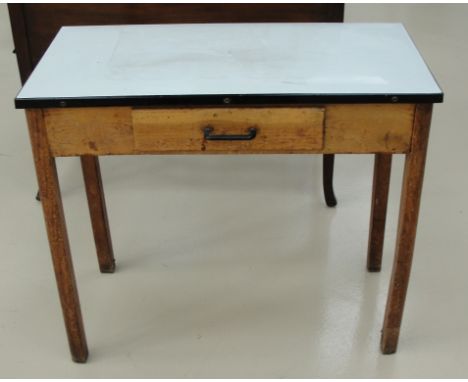 A 1950s kitchen table with enamel top